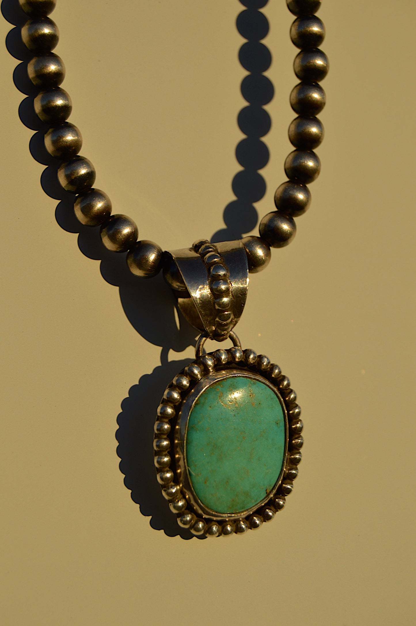 Beaded turquoise pendant