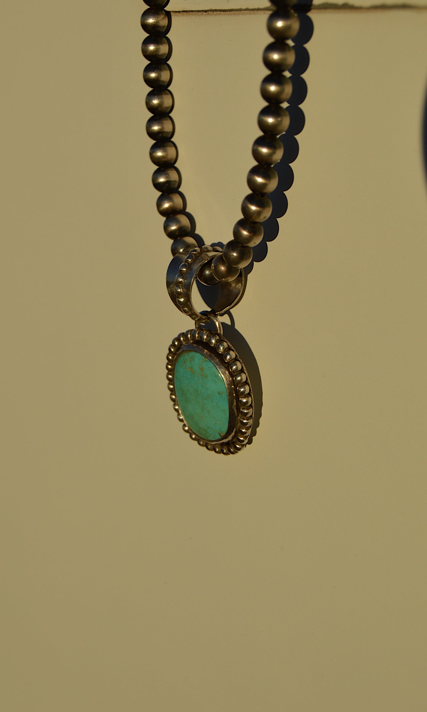 Beaded turquoise pendant